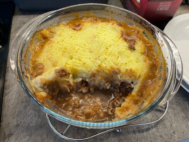 Cottage pie with one serving taken.