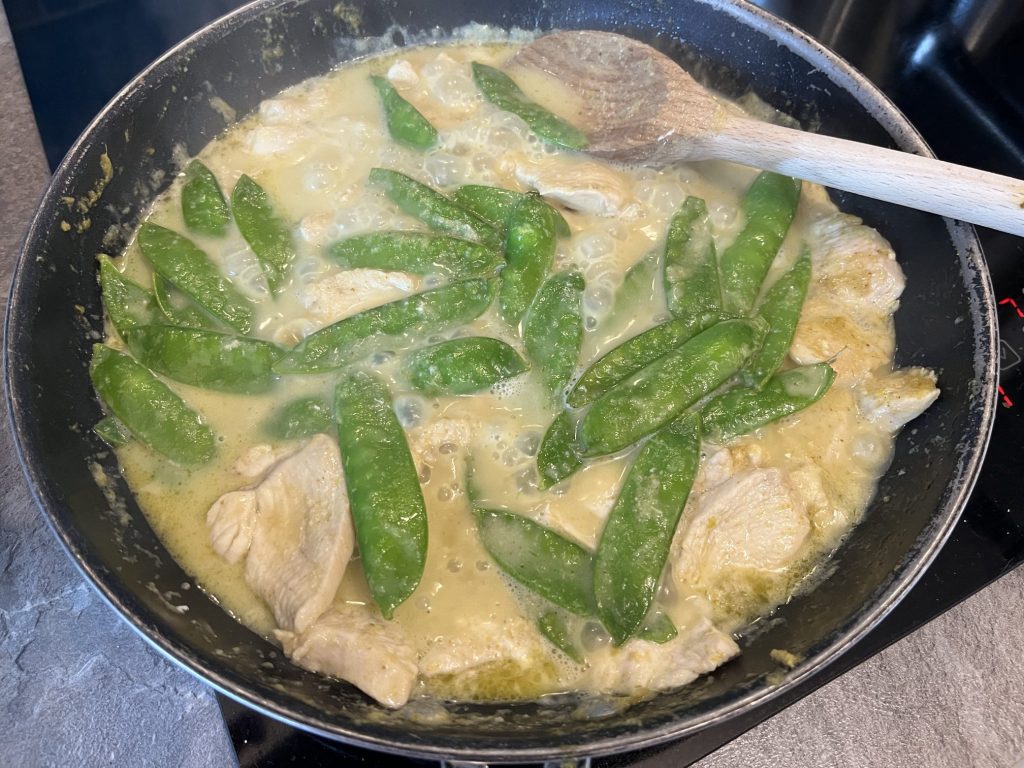 Thai green curry nearly ready to serve.
