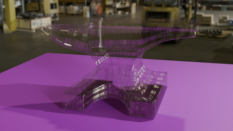 Glass anvil on a purple table with a workshop in the background. 